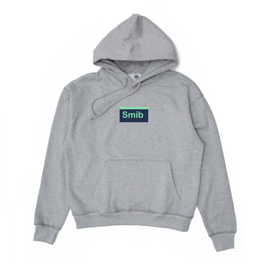 Smib x Mascotte FUCK OV Hoodie in grey melange with Smib logo on front, kangaroo pockets, ribbed cuffs, and embroidered hood logo.